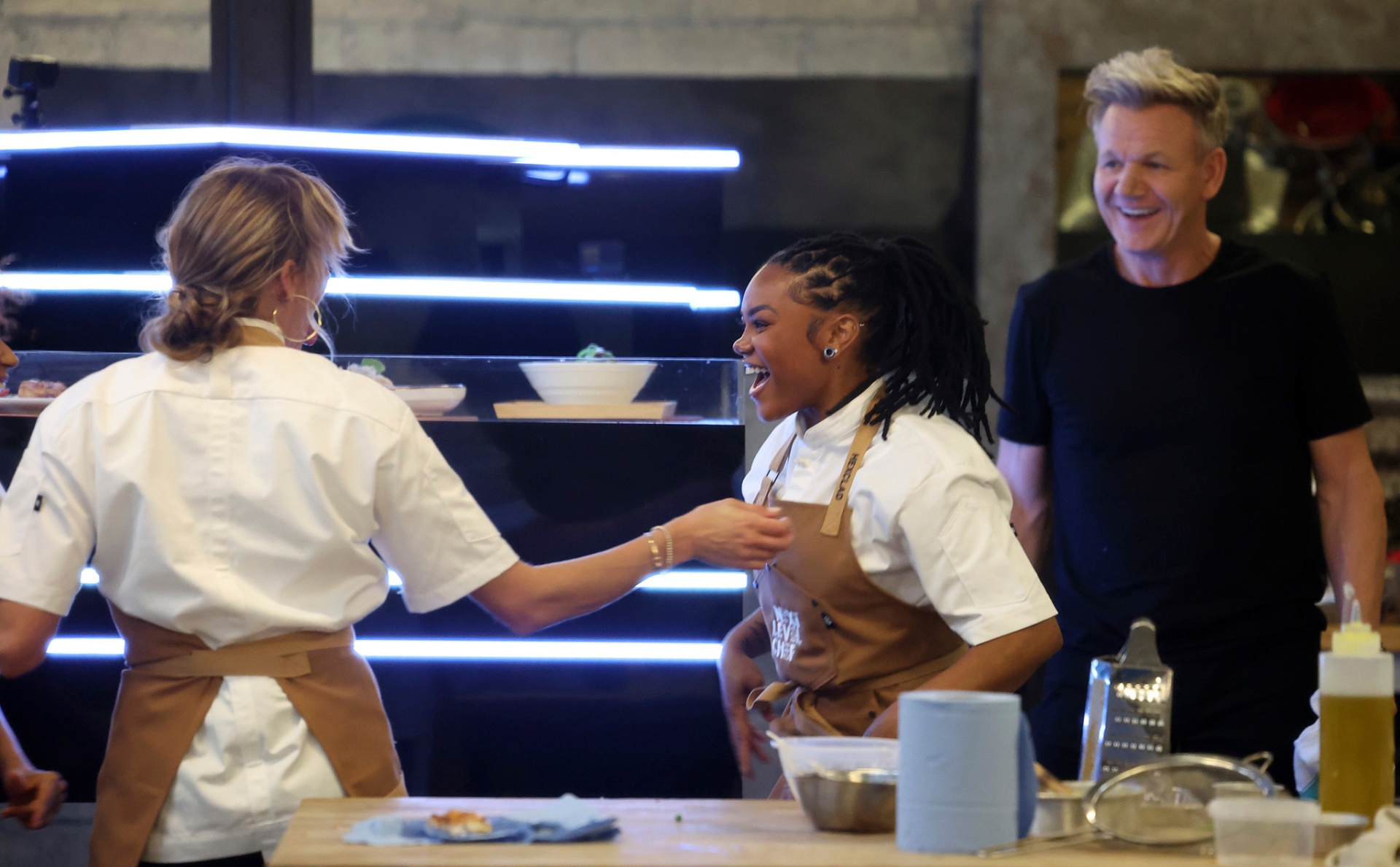 Chef Cole laughing on the line with Gordon Ramsay